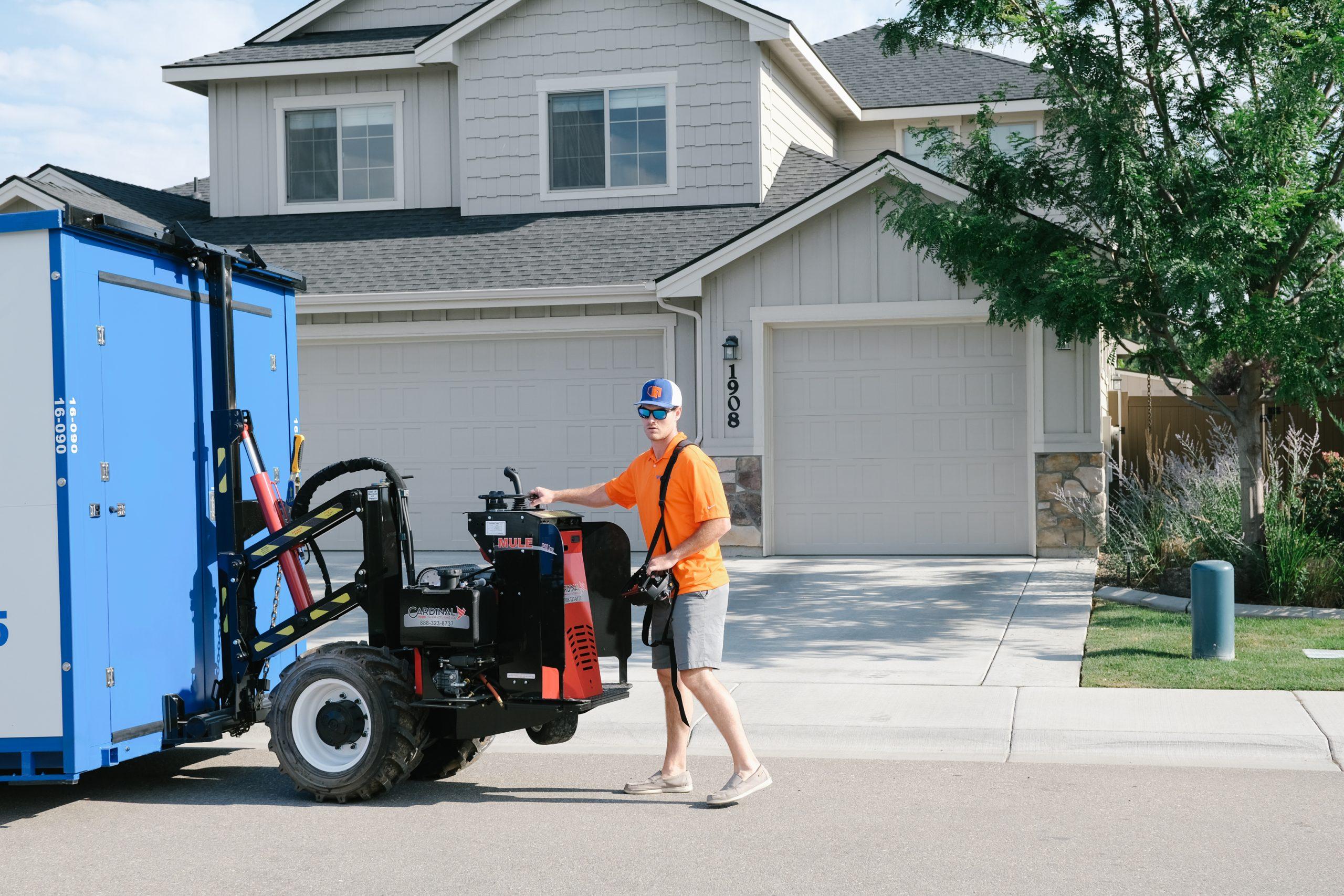 BoiseBox delivery truck placing a portable storage container